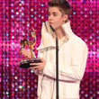 Justin Bieber, trois ans de carrière en images