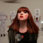 Luce dessine des nuages noirs dans son 1er clip