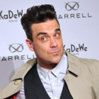 Attaqué, Robbie Williams s'emporte sur son blog
