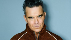Robbie Williams sort par surprise son nouvel album !