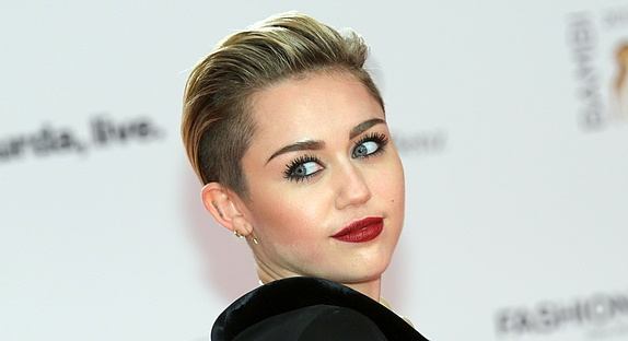 Robbie Williams met en garde Miley Cyrus