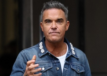 Robbie Williams explique pourquoi il repousse son album