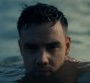 Clip "Live Forever" : Liam Payne se met à nu sur la plage avec Cheat Codes