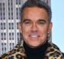 Robbie Williams dit tout sur son nouvel album