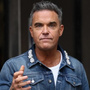 Robbie Williams explique pourquoi il repousse son album