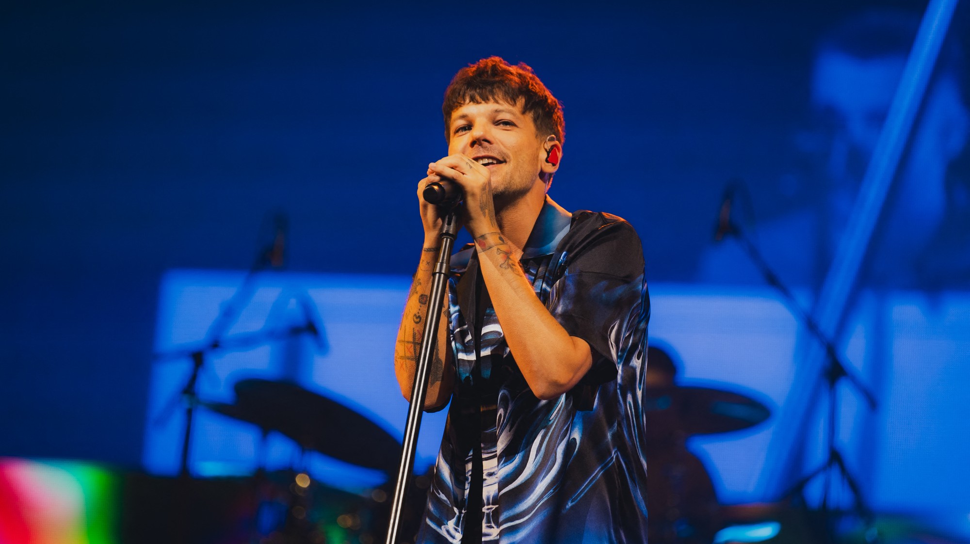 Louis Tomlinson, outré par des places en visibilité réduite, va rembourser des fans